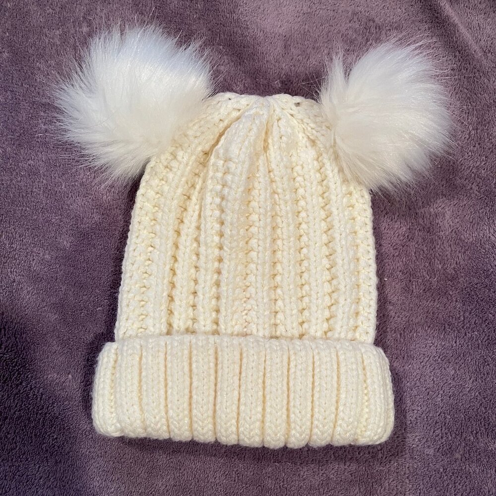 TOBY AND ME child’s knit beanie, cream color with iridescent threads, two pomps